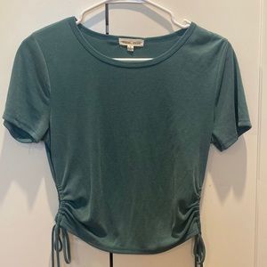 Green top with scrunched tie sides
